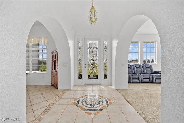 foyer with light tile patterned floors