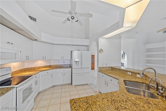 kitchen featuring sink, white cabinetry, white appliances, light tile patterned floors, and ceiling fan