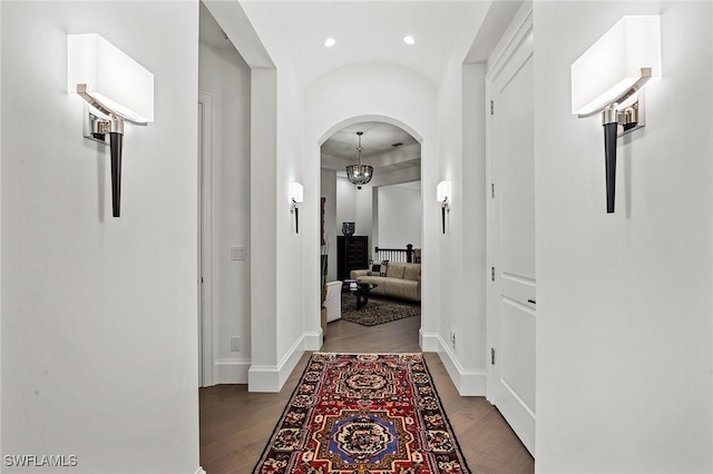 corridor with light wood-type flooring