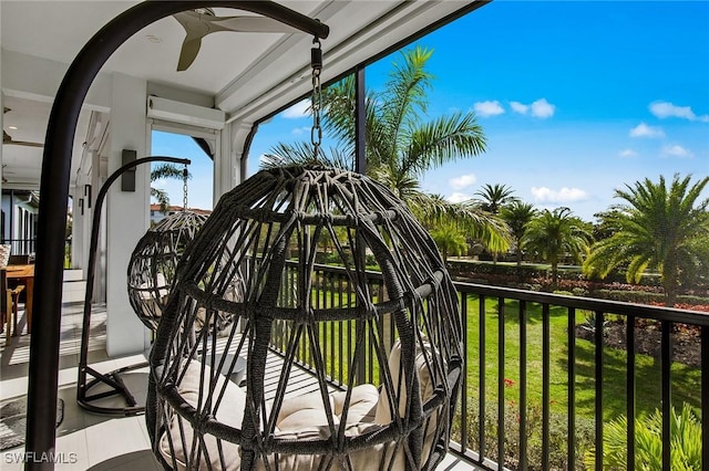 exterior space featuring ceiling fan