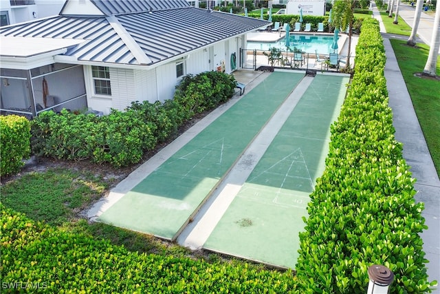 view of home's community with a pool