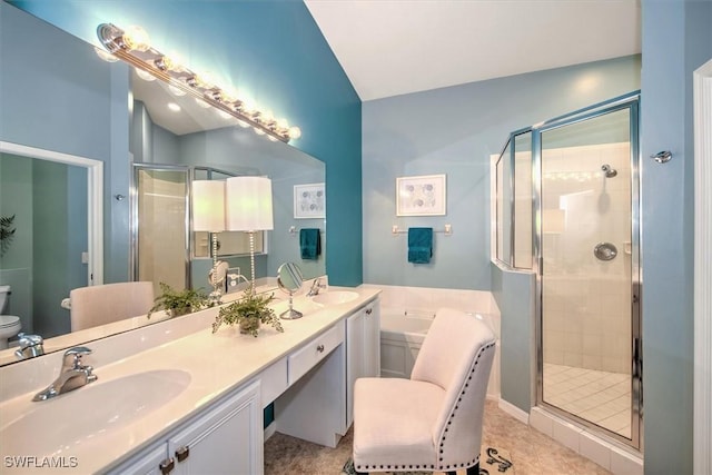 bathroom featuring a sink and a stall shower