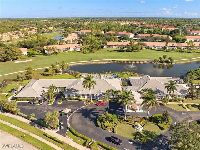 bird's eye view with a residential view and a water view