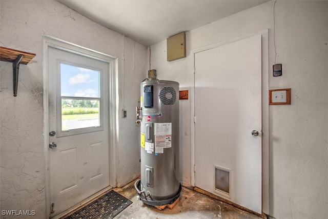 doorway to outside featuring water heater