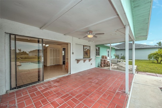 view of patio / terrace featuring ceiling fan