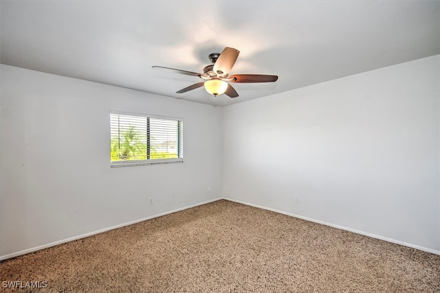 unfurnished room featuring carpet floors and ceiling fan