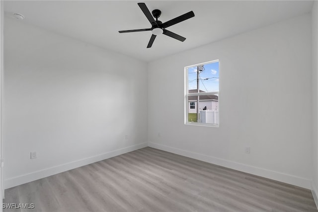 unfurnished room featuring ceiling fan and light hardwood / wood-style flooring