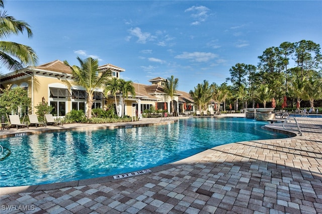 view of pool featuring a patio