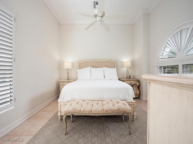 bedroom featuring ornamental molding, light tile patterned floors, and ceiling fan