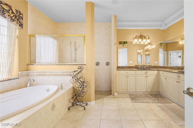 bathroom featuring tile patterned flooring, shower with separate bathtub, and vanity