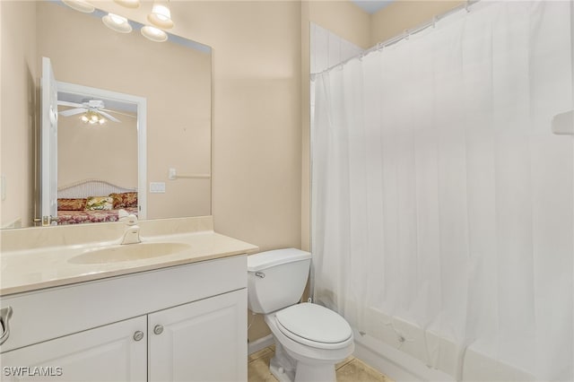 bathroom with a shower with curtain, ceiling fan, toilet, and vanity