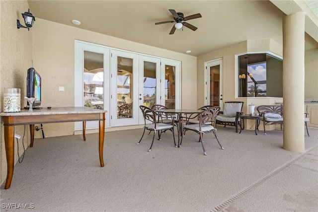 exterior space with ceiling fan, french doors, and carpet