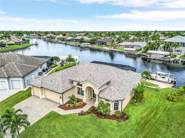 bird's eye view with a water view