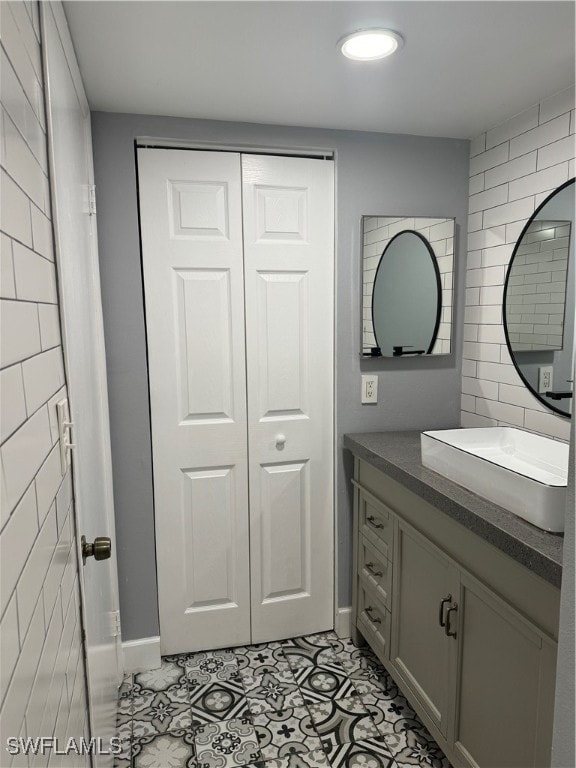 bathroom featuring vanity and tile patterned flooring