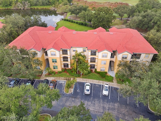 drone / aerial view with a water view