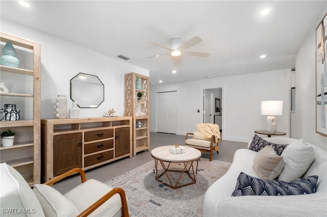 living room featuring ceiling fan