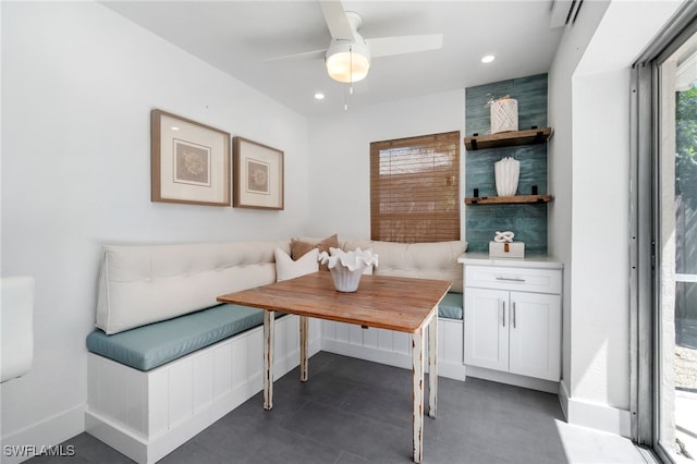 dining space with breakfast area and ceiling fan