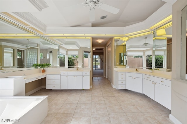 bathroom featuring ceiling fan, vanity, and ornamental molding