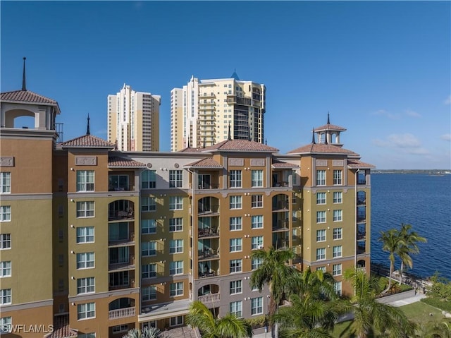 view of building exterior featuring a water view