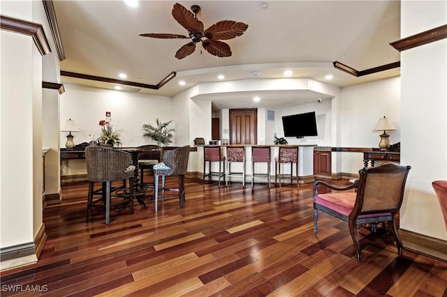 interior space featuring ceiling fan and dark hardwood / wood-style flooring