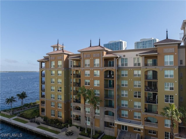 view of building exterior featuring a water view