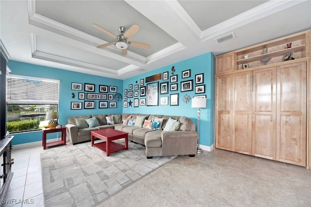 tiled living room featuring crown molding and ceiling fan