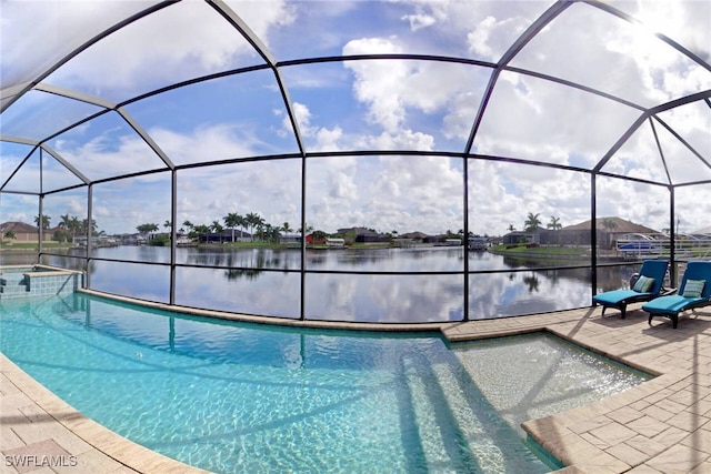 view of swimming pool with a water view, a patio, and a lanai