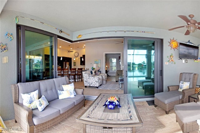 living room featuring ceiling fan