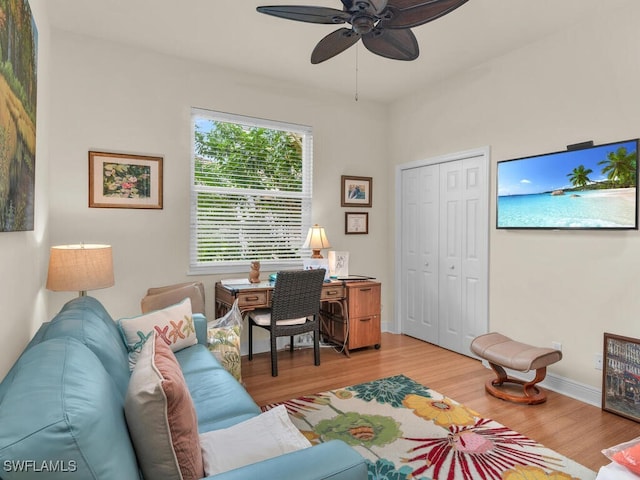 home office featuring ceiling fan and hardwood / wood-style floors