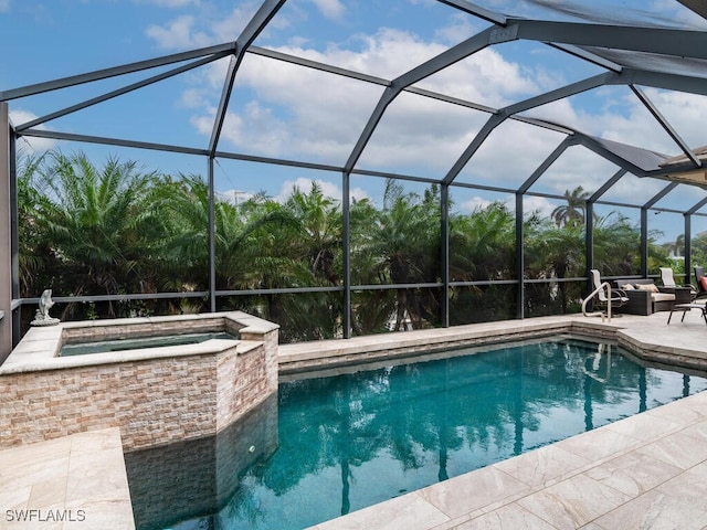 view of swimming pool featuring an in ground hot tub, a patio, and glass enclosure