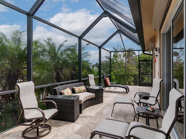 view of patio featuring an outdoor hangout area and a lanai