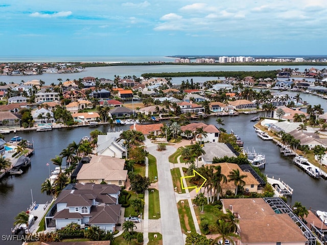 bird's eye view with a water view