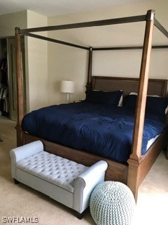 bedroom with light colored carpet