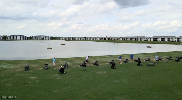 view of home's community with a water view