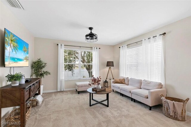 living room with light carpet