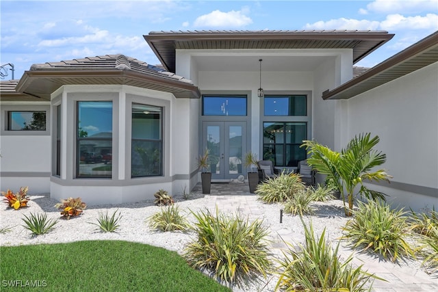 view of exterior entry with french doors