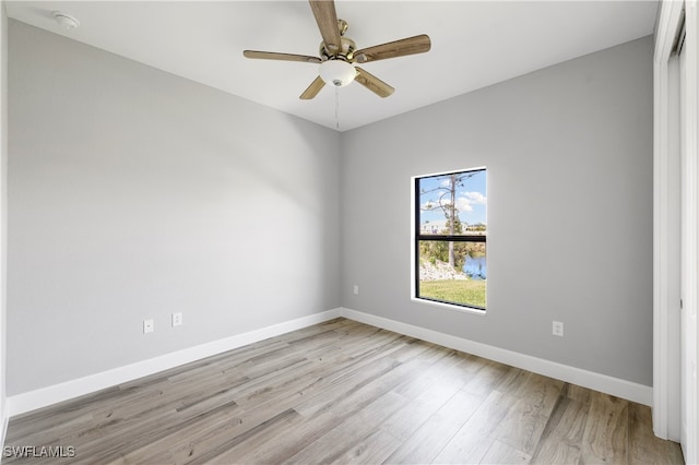 unfurnished room featuring light hardwood / wood-style floors and ceiling fan