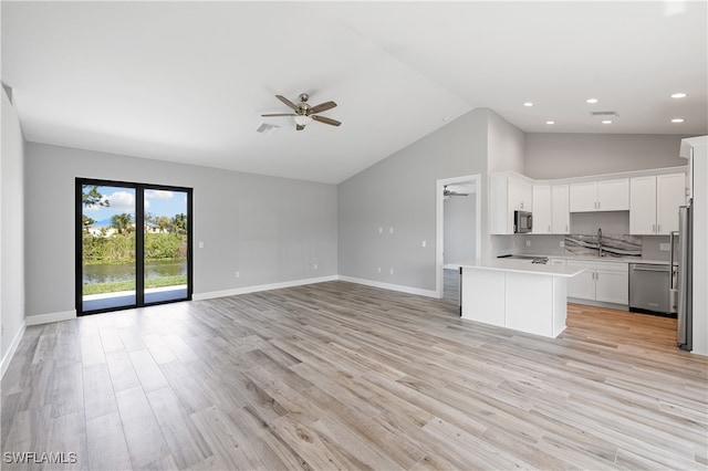 kitchen featuring light hardwood / wood-style floors, white cabinetry, stainless steel appliances, ceiling fan, and sink