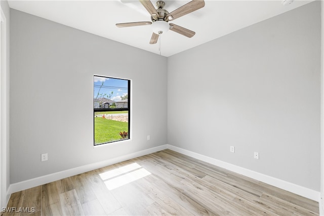 unfurnished room with ceiling fan and light hardwood / wood-style flooring