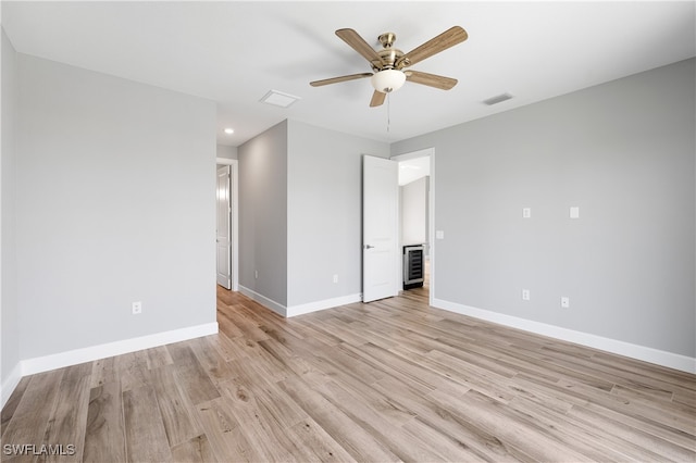 interior space featuring light hardwood / wood-style floors and ceiling fan