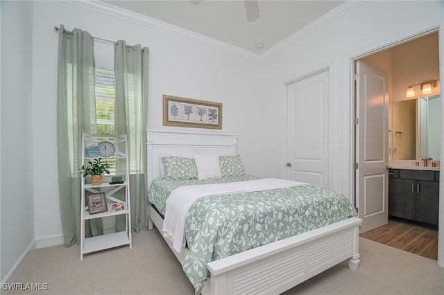 bedroom featuring ceiling fan, crown molding, connected bathroom, and wood-type flooring