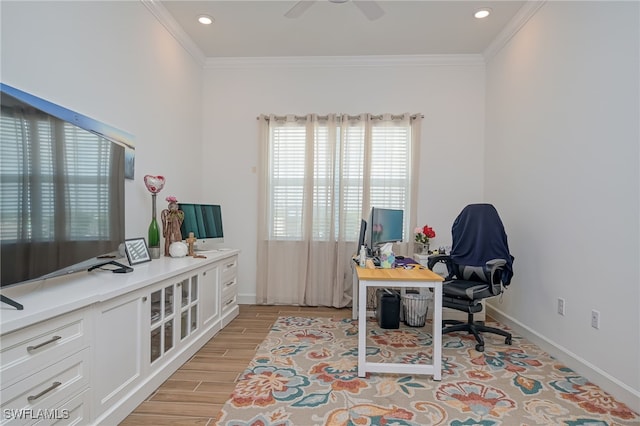 home office featuring light hardwood / wood-style flooring, ceiling fan, and ornamental molding