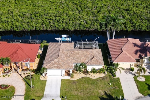 bird's eye view with a water view