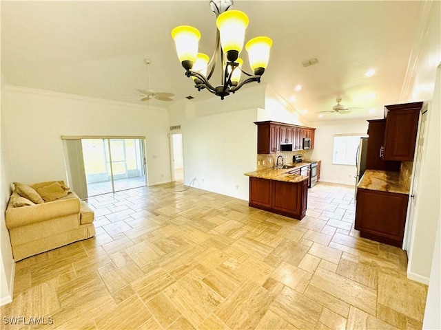 kitchen with ceiling fan with notable chandelier, sink, ornamental molding, and backsplash