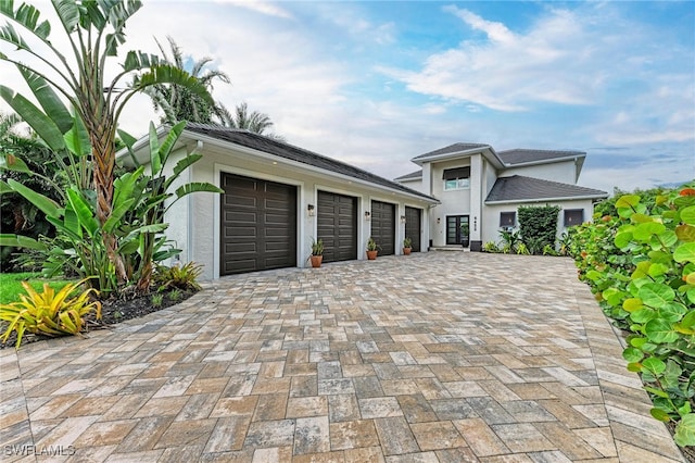 view of front of home with a garage