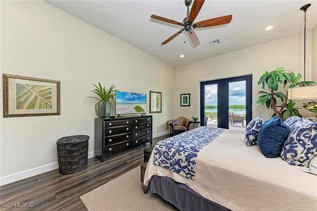 bedroom with access to outside, dark hardwood / wood-style flooring, ceiling fan, and french doors