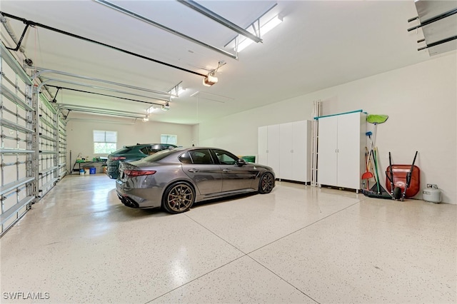 garage featuring a garage door opener