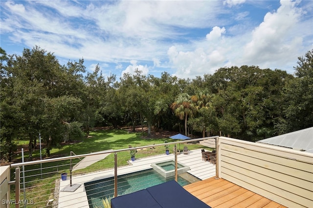 wooden deck with a swimming pool with hot tub