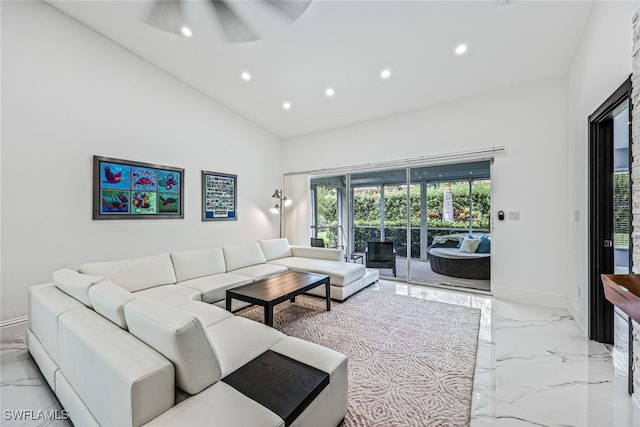 living room with lofted ceiling and ceiling fan