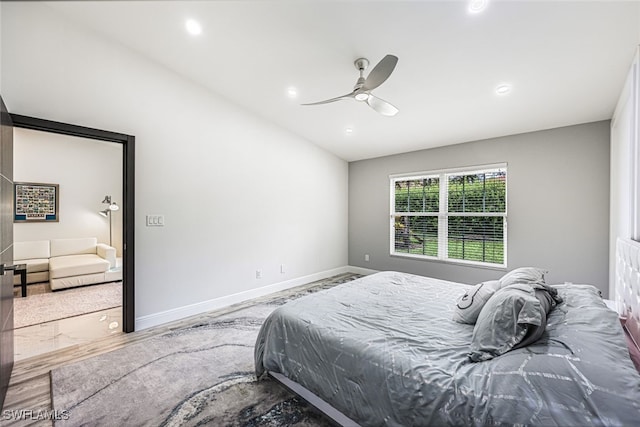 bedroom featuring ceiling fan and wood-type flooring